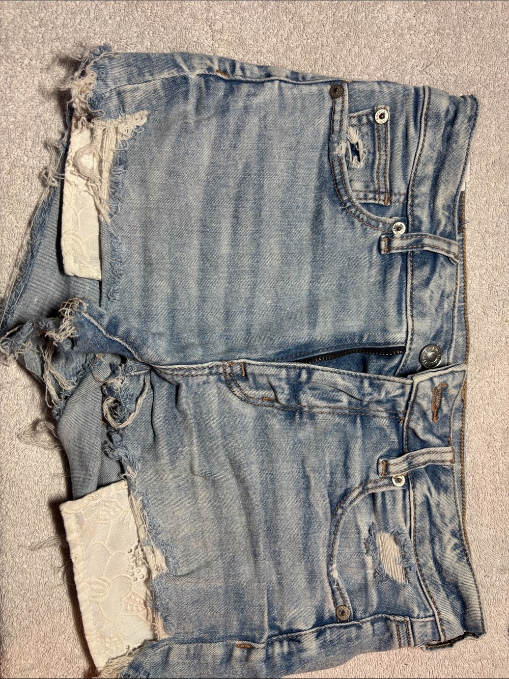 American Eagle Outfitters Light Wash Distressed Denim Shorts with Lace Trim